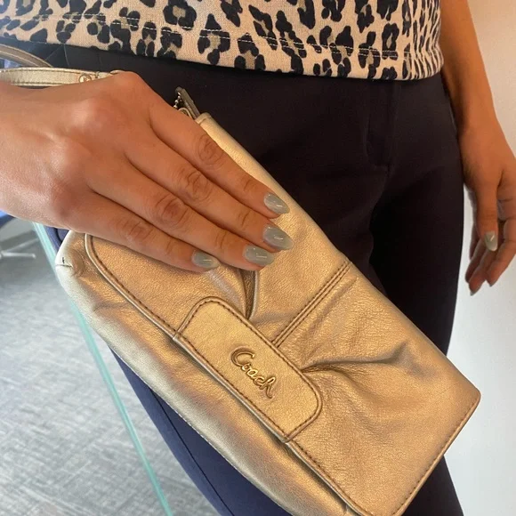Coach Wristlet in Silver/Gold Depending on Lighting - Picture 2 of 13